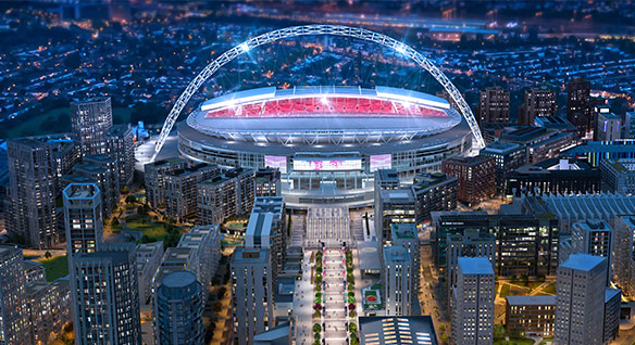 Detailed render of a reimagined Wembley stadium seen at night in a lit-up London 